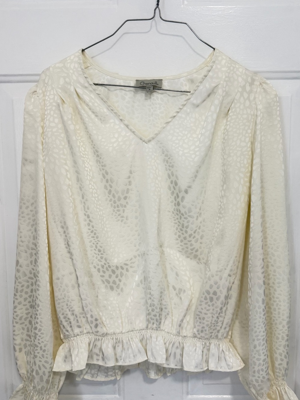 Chenault Cream V-Neck Long Sleeve Ruffle-Hem Blouse